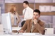 Confident businessman at further education Confident businessman at further education