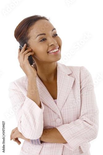 Photo: Happy businesswoman on call Happy businesswoman on call