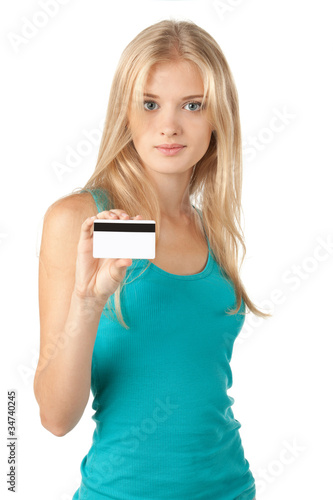 Photo: Portrait of beautiful blond female holding credit card Portrait of beautiful blond female holding credit card