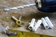 Detail of construction tools over a wooden table