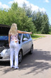 Photo: The girl votes at a road roadside The girl votes at a road roadside