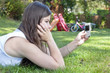 Photo: teenage girl with mobile cell phone outdoor teenage girl with mobile cell phone outdoor