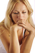 Sad blond woman, isolated