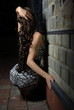 Back of a female with long curly hair