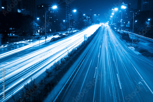Photo: light trails with blue tone light trails with blue tone
