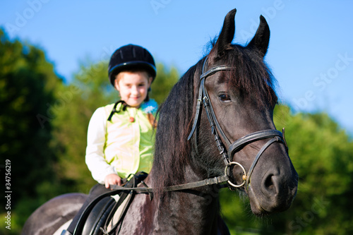 Photo: Little girl with horse Little girl with horse