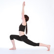 Photo: Yoga Warrior One pose Virabhadrasana by fit woman Yoga Warrior One pose Virabhadrasana by fit woman