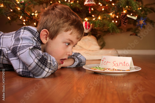 Photo: Boy wakes up to find someone ate the cookies Boy wakes up to find someone ate the cookies