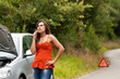 Photo: Broken Car - Young Woman Calls for Assistance Broken Car - Young Woman Calls for Assistance