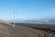Speed sign on the ocean beach