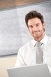 Portrait of handsome businessman smiling
