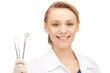 dentist with tools