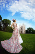 Princess in an vintage dress before the magic castle Princess in an vintage dress before the magic castle