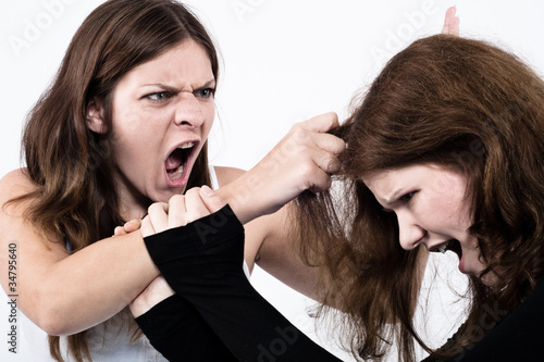 Photo: Two women fighting and screaming Two women fighting and screaming