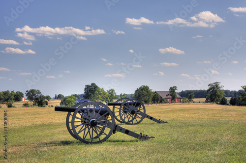 Photo: Two civil war era cannons in open field Two civil war era cannons in open field