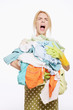 Woman with a pile of clothing