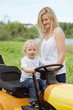 Photo: Boy Toddler Sitting on Lawn Tractor Boy Toddler Sitting on Lawn Tractor