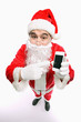 Santa claus pointing at mobile phone