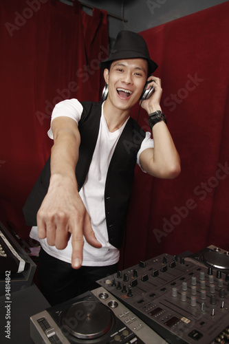 Photo: Man spinning turntable Man spinning turntable