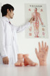 Man pointing at medical diagram