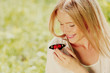 Woman playing with a butterfly