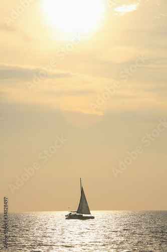 Photo: Sailboat sailing in the morning Sailboat sailing in the morning