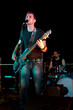 Electric bass-guitar player