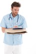 Young doctor writing notes