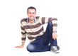 Portrait of a casual young satisfied man sitting