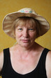 senior woman in the straw hat senior woman in the straw hat