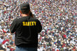 Security agent watching public event