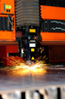 Industrial laser with sparks flying around