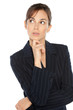Young pensive business woman looking upwards