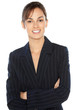 Positive young business woman standing with folded hands