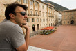 Photo: Adult Tourist Visiting Towns in Tuscany and Umbria, Italy Adult Tourist Visiting Towns in Tuscany and Umbria, Italy