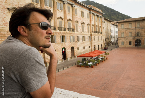 Photo: Adult Tourist Visiting Towns in Tuscany and Umbria, Italy Adult Tourist Visiting Towns in Tuscany and Umbria, Italy
