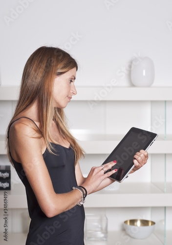 Foto: woman with a tablet woman with a tablet