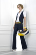 Portrait of a styled professional model holding purse Portrait of a styled professional model holding purse