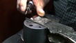 detail of craftman during make incision