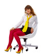Beautiful woman in bright clothes in a chair