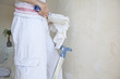 girl painting apartment