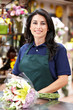 Hispanic woman working in florist
