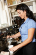 Woman working in coffee shop