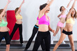 Group of gym people in an aerobics class Group of gym people in an aerobics class