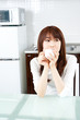 attractive asian woman in the kitchen