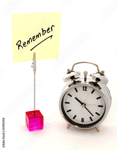Photo: Remember, yellow note and clock Remember, yellow note and clock
