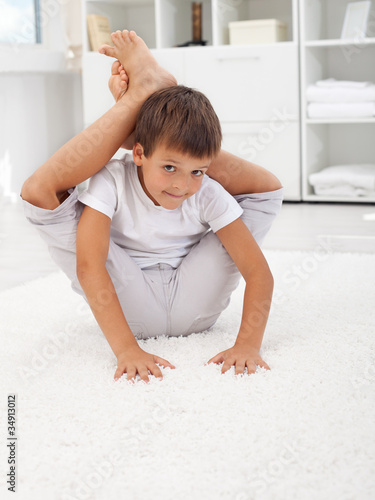 Photo: Little contortionist boy Little contortionist boy