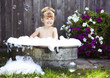 Photo: Little girl in a retro bath Little girl in a retro bath