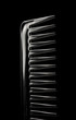 Foto: comb on black blackground comb on black blackground