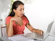 bored girl with laptop homeworking